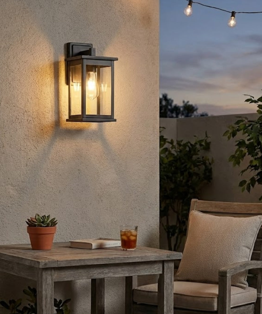Bowton II Outdoor Wall Light - Dusk to Dawn Matte Black Finish with Glass Shade by Millennium Lighting - 11"H