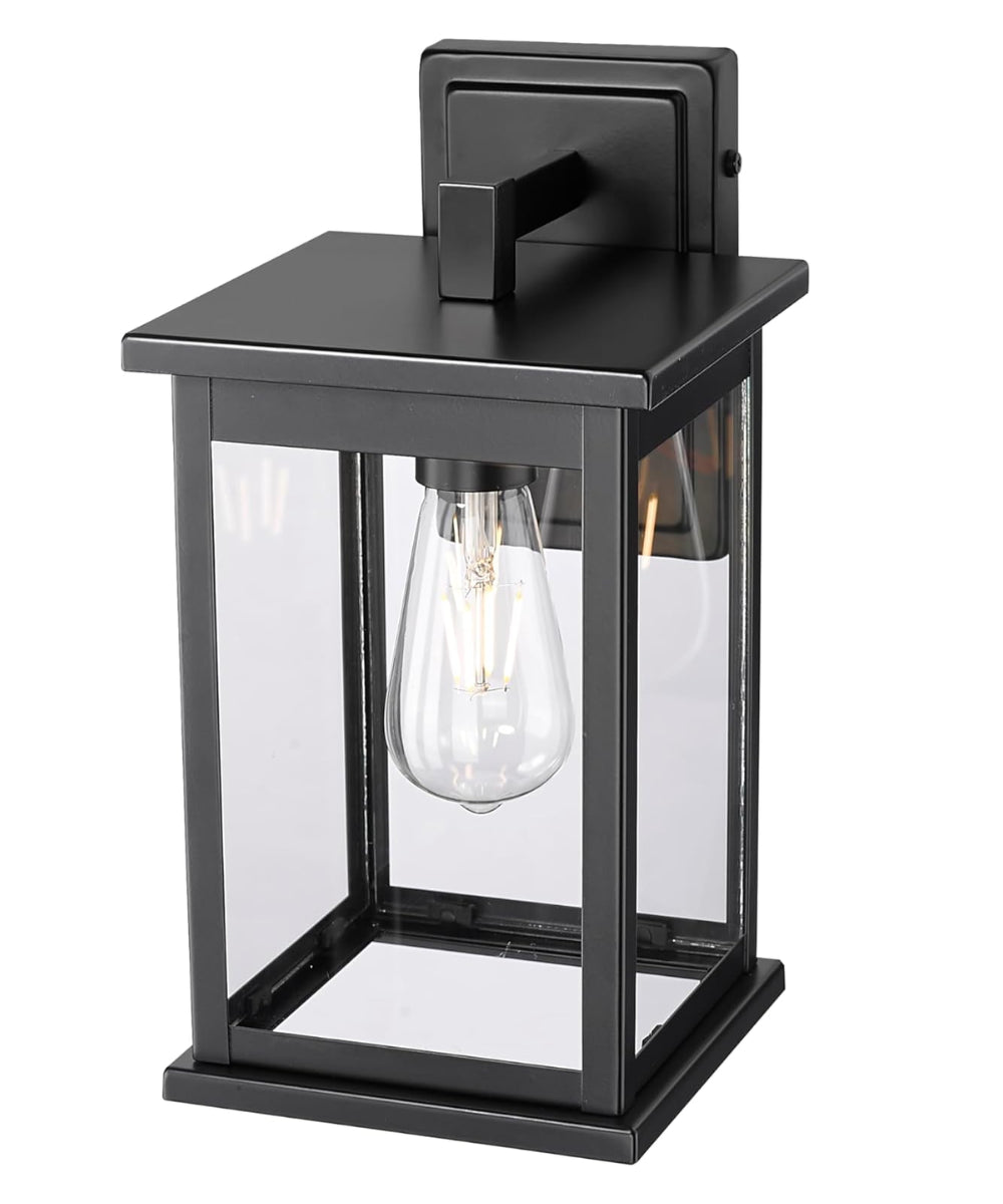 Bowton II Outdoor Wall Light - Dusk to Dawn Matte Black Finish with Glass Shade by Millennium Lighting - 11"H