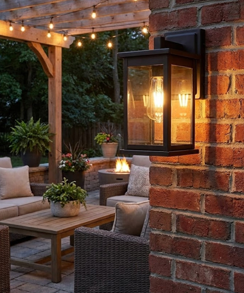 Bowton II Outdoor Wall Light - Dusk to Dawn Matte Black Finish with Glass Shade by Millennium Lighting - 11"H