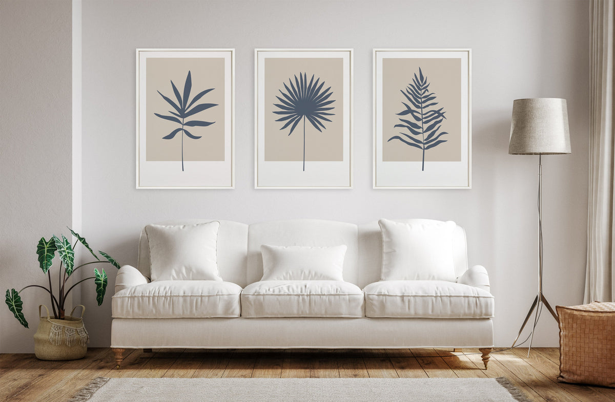 Sylvie Muted Tan and Blue Colorblock Botanical Palm Framed Canvas by The Creative Bunch Studio