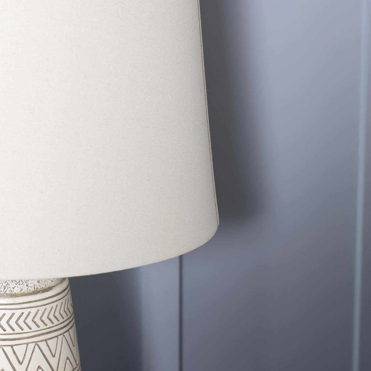 Camaligan Tan and Cream Resin Table Lamp with Linen Shade