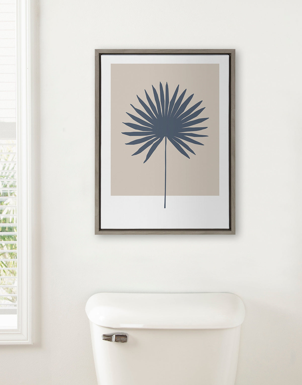 Sylvie Muted Tan and Blue Colorblock Botanical Palm Framed Canvas by The Creative Bunch Studio